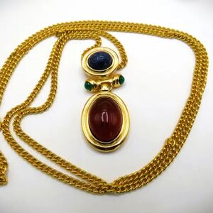 Elegant Gold Necklace with Red and Blue Accents